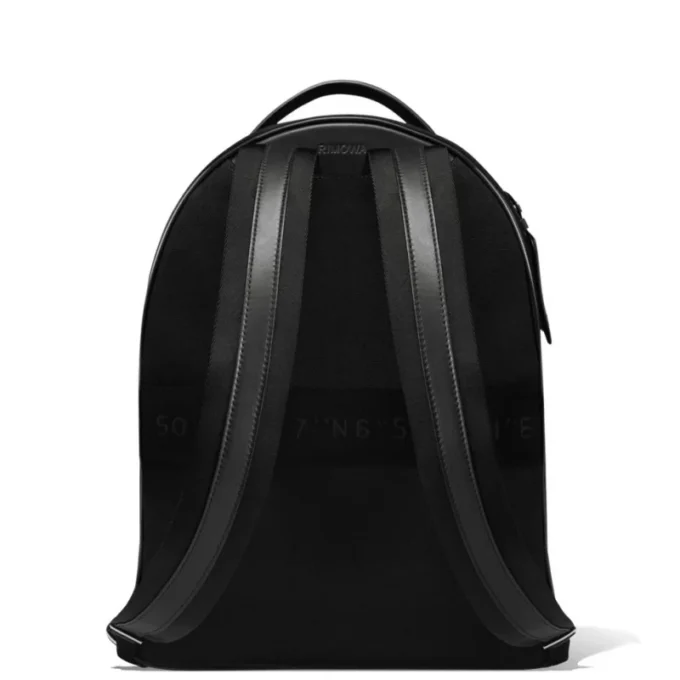 Sac à dos moyen en cuir et toile Sac à dos moyen en cuir et toile